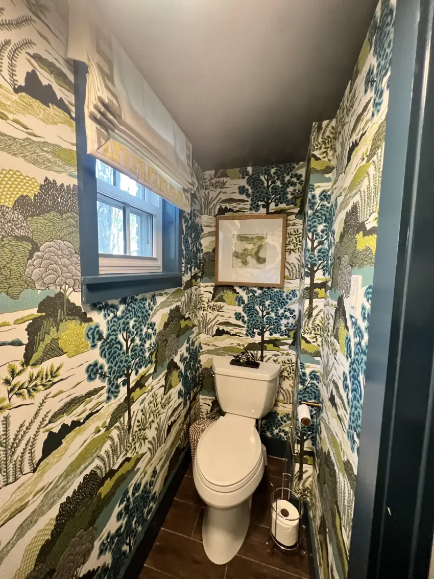 A bathroom with a toilet and sink in it