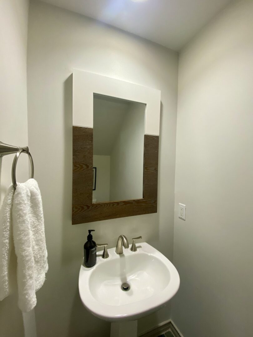 White and Brown Bathroom Mirror