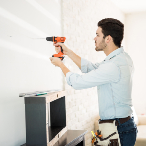 A person using Drill Machine